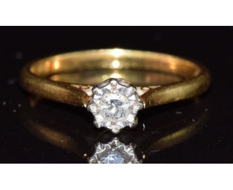 An 18ct gold ring set with a diamond in an platinum illusion setting, 2.1g, size K