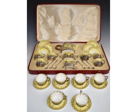 Edward VII cased hallmarked silver mounted porcelain tea set in case with additional items, the case marked Wilson &amp; Gill