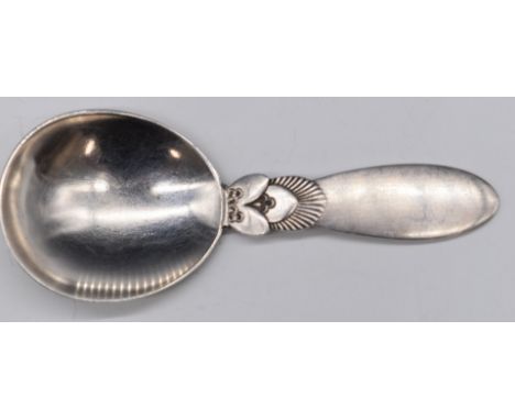 Georg Jensen hallmarked silver caddy spoon with import marks for London 1947, length 9.5cm, weight 26g