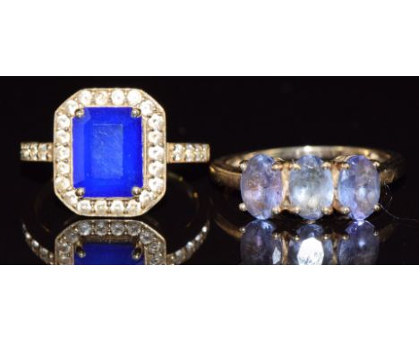 Two 9ct gold rings, one set with tanzanites and one paste, 5.1g, size K/ L