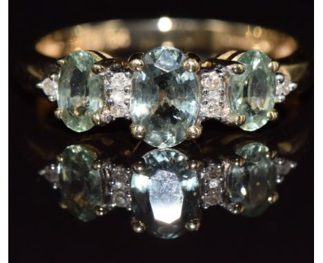 A 9ct gold ring set with sapphires and diamonds, 1.8g, size J