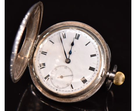 Unnamed silver keyless winding half hunter pocket watch with subsidiary seconds dial, blued hands, black Roman numerals, whit