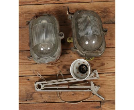 A pair of outdoor industrial wall lights along with a small Dyno anglepoise lamp.