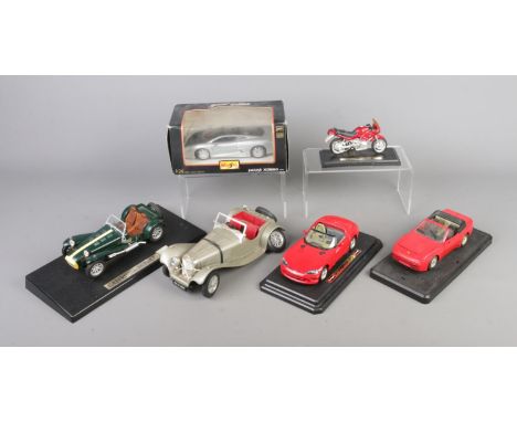 A collection of large scale diecast model vehicles to include Burago Viper RT/10 (1992), boxed Maisto Special Edition Jaguar 