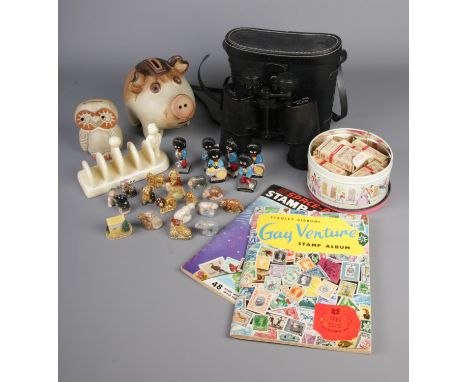 A mixed tray of collectables including Zenith binoculars, stamp albums and cigarette cards, Wade Whimsies, Robinson's figures