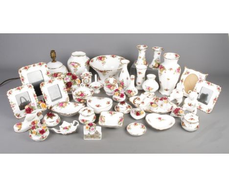 A good collection of Royal Albert Old Country Roses ceramics to include table lamp, assorted ornaments, pair of candlesticks,