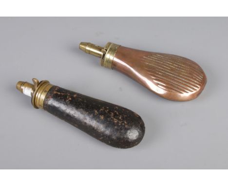 Two antique gun powder flasks, including one G. &amp; J. W.H leather flask and one brass Sykes Patent powder flask.