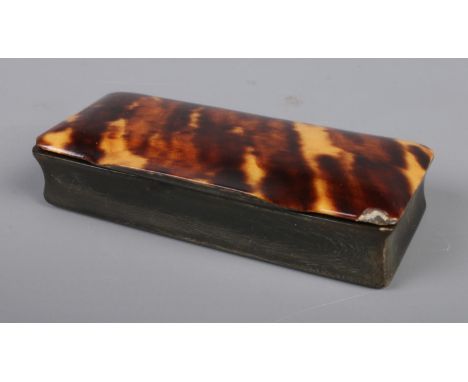 A tortoiseshell hinged snuff box. Approx. length 8cm.