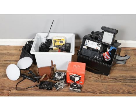 A collection of cameras, camera accessories and lens, including a Ferguson Compact Colour Video Camera, Yankee Developing Tan