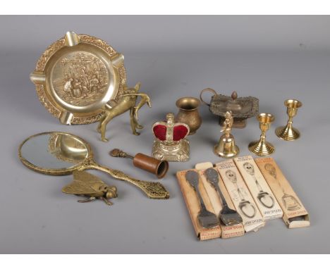 A tray of metalwares including tool brush, bronze figure of a hyena, brass fly trinket box, hand mirror, silver jubilee pin c