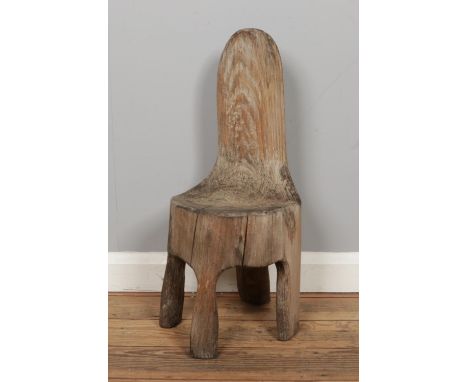 A vintage tree trunk chair. Size: W29 x D32 x H65cm.