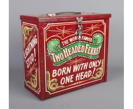 A hand-painted Gypsy style tin trunk formed as a ferret cage, advertising the 'Tatters Ferret Racing Team' and 'The World Fam