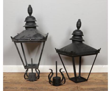 A pair of Victorian style black galvanised lanterns. Size: W38 x D38 x H87cm.  No glass, one lantern has missing screws.