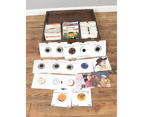 A case of assorted vinyl singles of mostly 1980's/1990's rock and pop to include Annie Lennox, Diana Ross, Cyndi Lauper, Whit