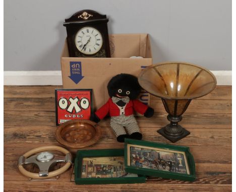 A box of mixed collectables including a golly doll, OXO cube tile, vintage trays, metal and glass centrepiece, modern wall cl