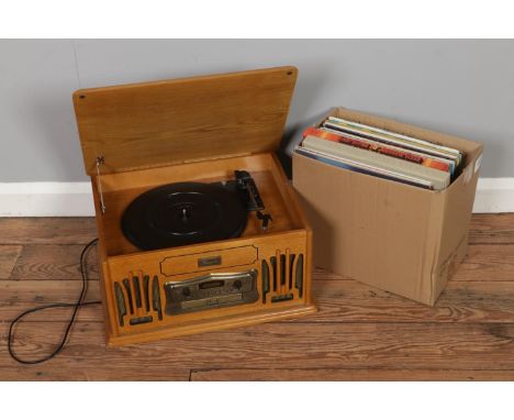 A Classic Collectors' Edition wooden cased retro record player, CD and tape deck with a small selection of records including 