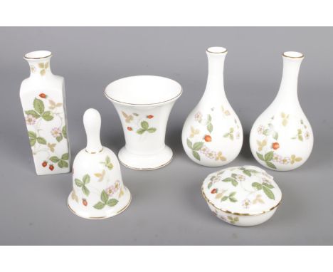 A small collection of Wedgwood ceramics in the Wild Strawberry pattern to include bud vases, trinket box and bell.