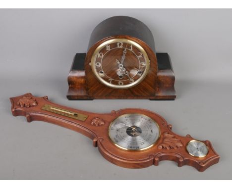 A vintage Weathermaster barometer with a British made Westminster mantle clock.  Mantle clock with key and pendulum, running 