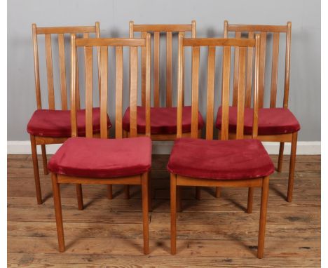 Five vintage teak dining chairs, with fabric seat base.