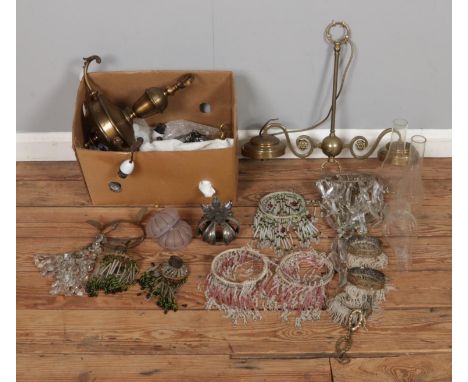 A box containing good quality vintage lighting, including two large brass ceiling lights, many hanging lustre drops, glass sh