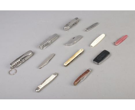 Twelve folding knives and pocket tools, to include 1981 Royal Wedding, Richards of Sheffield, T. Turner &amp; Co and wooden b