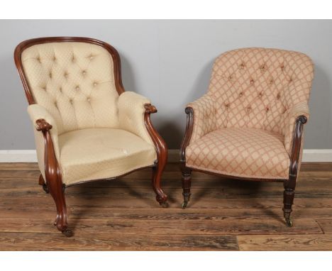 A carved walnut spoon back armchair with deep button back rest, together with a smaller button back armchair. Both raised on 