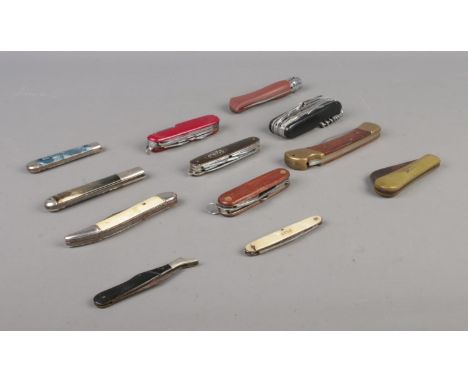 Twelve assorted folding knives, including Wilkinson Sword, Richards of Sheffield and multi-tool examples. CANNOT POST.