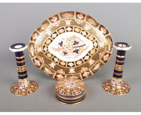 A Victorian Collingwood Brothers five piece Imari dressing table set to include tray, pair of candlesticks and trinket box.  