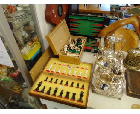 A backgammon set and three boxed Chess sets