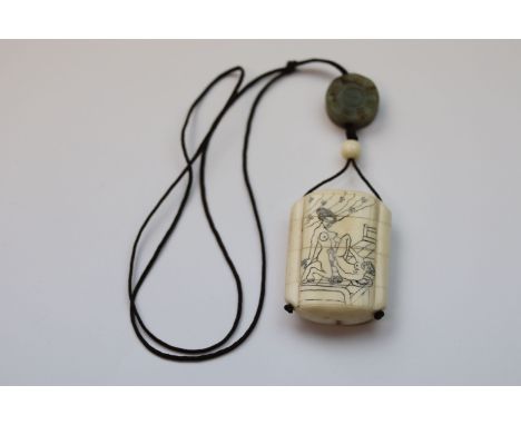 A Japanese bone four section erotic inro with jade toggle, dimensions of inro approximately 55mm by 42mm