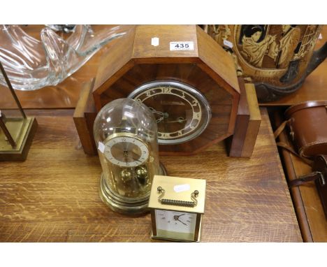 Key wind wooden cased Mantle clock, a glass domed Anniversary clock and a Metamec Carriage clock
