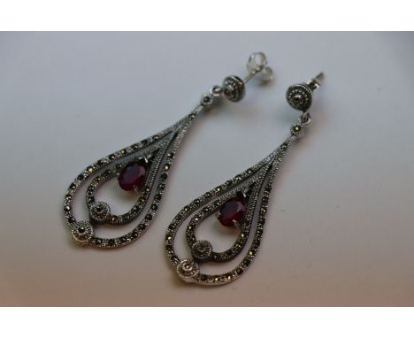 A pair of silver CZ and simulated ruby drop earrings in the art deco style 