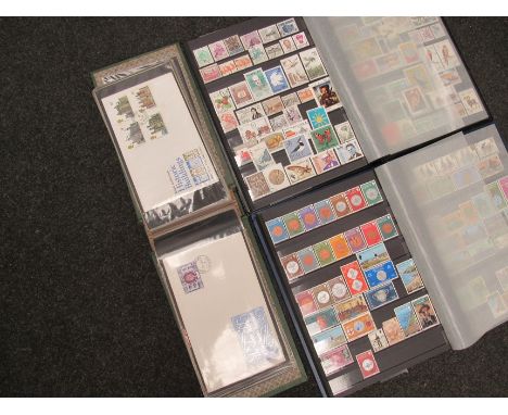 Three albums of stamps and first day covers 