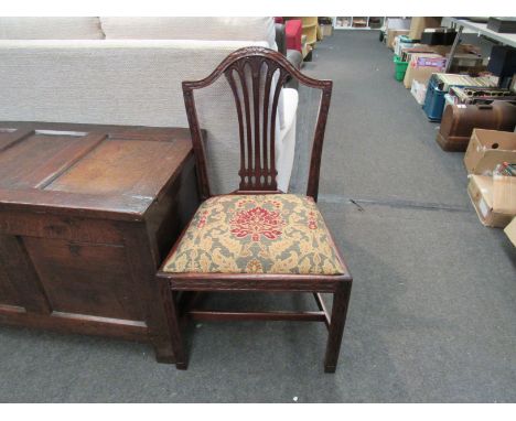 A George III mahogany Chippendale design chair with carved floral decoration