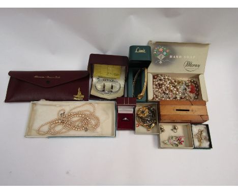 A box of bijouterie including 9ct gold and silver ring, faux pearls, costume brooches, watches etc