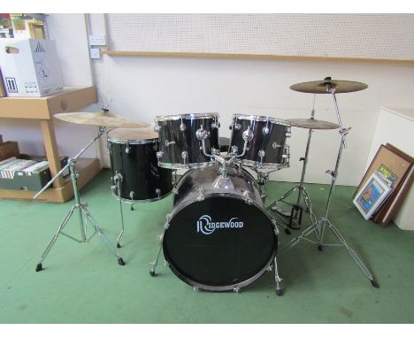 A Ridgewood five piece drum kit and cymbals    