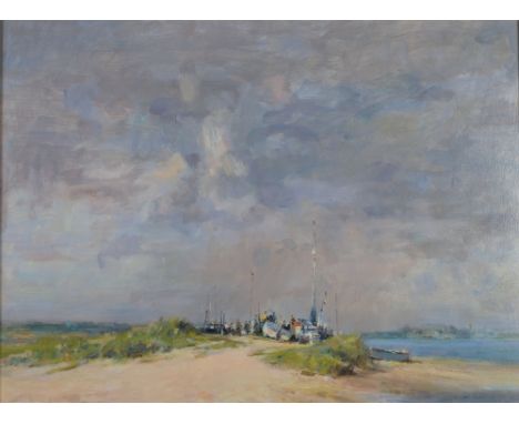 GORDON RADFORD  OIL PAINTING ON BOARD  'Walberswick'  Beach scene with figures and beached boats Signed lower right  18" x 24