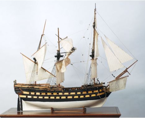 KIT BUILD BALSA WOOD MODEL OF THREE MASTED GUN SHIP, on wood stand, 35 3/4" (90.8cm) high overall, 41" (104.1cm) long