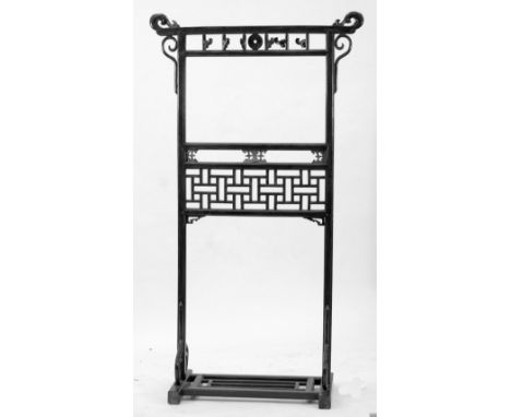 CHINESE CARVED REDWOOD HALL STAND, the flat top rail with scroll ends, above six coat hook, and central key fret pierced pane
