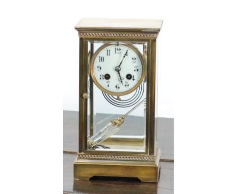 EARLY TWENTIETH CENTURY GILT BRASS FOUR GLASS MANTEL CLOCK, of  typical form with 3 1/2" Arabic dial, gong and mercury gilled