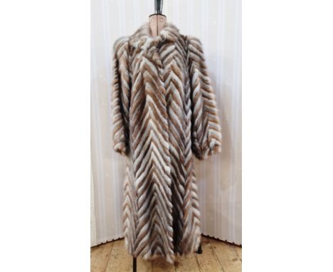 1980s mink coat, batwing sleeves, chevron design in light brown, grey and cream, labelled 'Vizon Furs, Soviet Greek Joint Ven