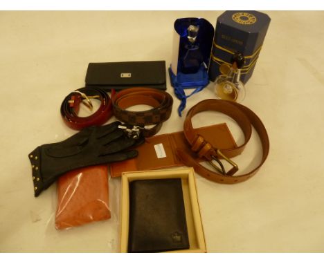 Tod's black leather wallet/purse lined in pale lilac, a Bric's note wallet, a Louis Philippe black wallet&nbsp;within its ori