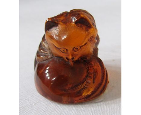 Japanese carved amber netsuke&nbsp;in the form of a fox, 2.5cm high, and&nbsp;a small collection of Asian mother-of-pearl eng
