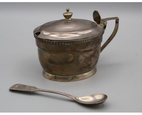 Henry Nutting, a George III silver mustard, oval thumbpiece and urn finial to the hinged cover, angular handle and gadrooned 