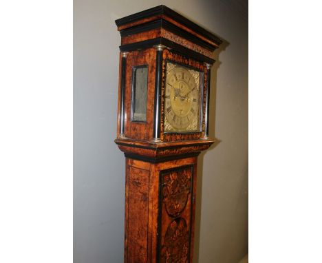 Henry Godfrey, London, eight day longcase clock in burr walnut and marquetry case. 11'' brass dial with seconds and date cale