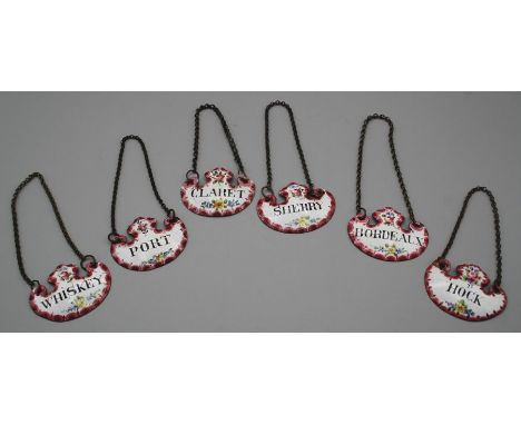 A set of six Victorian enamel on copper wine labels, probably Samson, Hock, Sherry, Port, Whisky, Claret and Bordeaux, 5cm wi