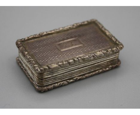 Thomas Shaw, a William IV silver vinaigrette, rectangular with florally cast borders, engine turned decoration around cartouc