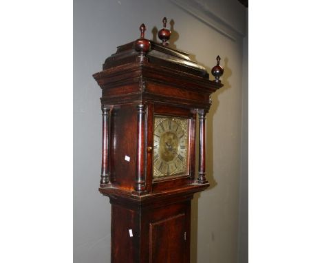 An early 18th century Quaker thirty hour hook and spike clock in original oak case, unsigned. 10'' dial with single hand, zig