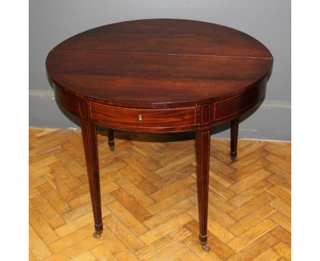 A George III mahogany supper table, the satinwood crossbanded demi-lune fold over top with double gate supports above a friez