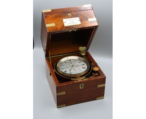 Russells Ltd, Liverpool, a mahogany and brass bound cased two day marine chronometer, gimbal mounted fusee movement with 10cm